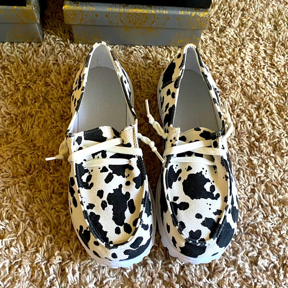 Cow print boat shoes (hey dude knock-offs)
